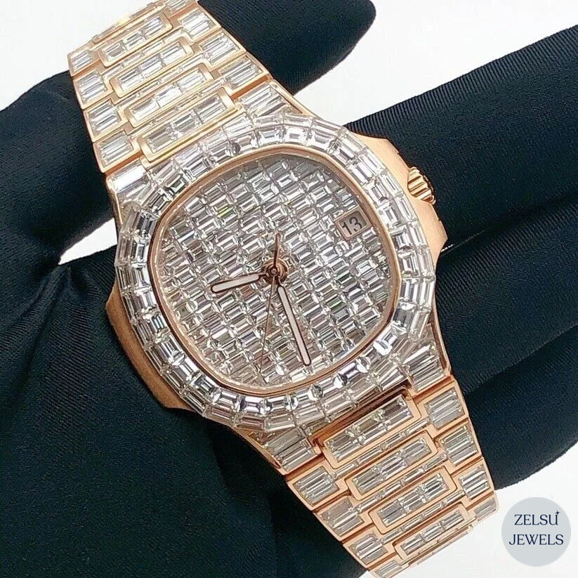 Luxury emerald diamond rose gold bust-down watch, offering opulence with radiant emerald diamonds.