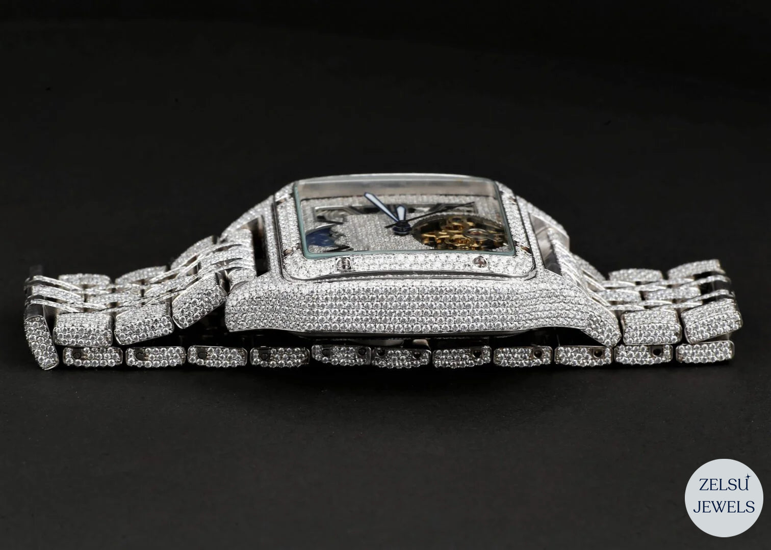 Unique crystal watch with blue crown, offering luxury with a modern twist for fashion-forward individuals.