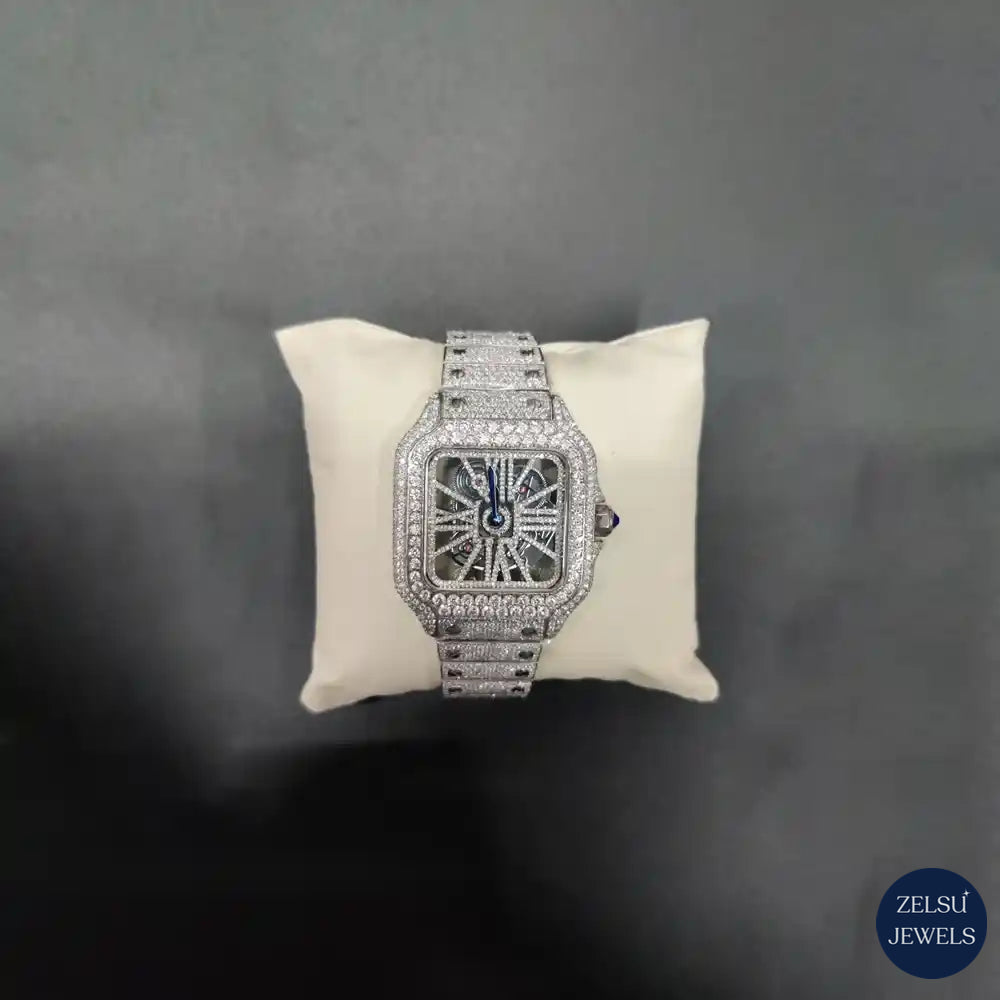 Classic Cartier silver automatic watch, combining elegance with mechanical precision and style.