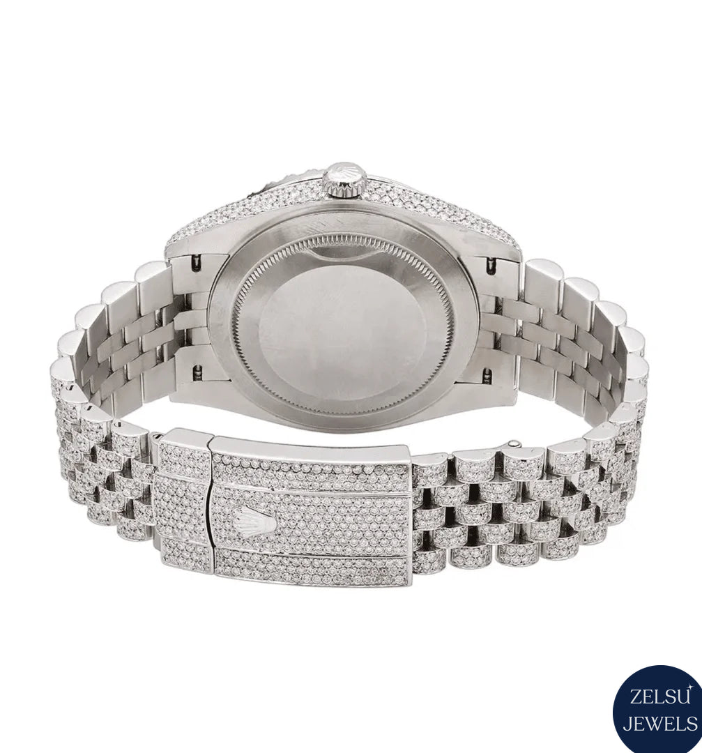 Rolex silver bust-down watch with a colorful rainbow dial, complemented by sparkling diamond accents.