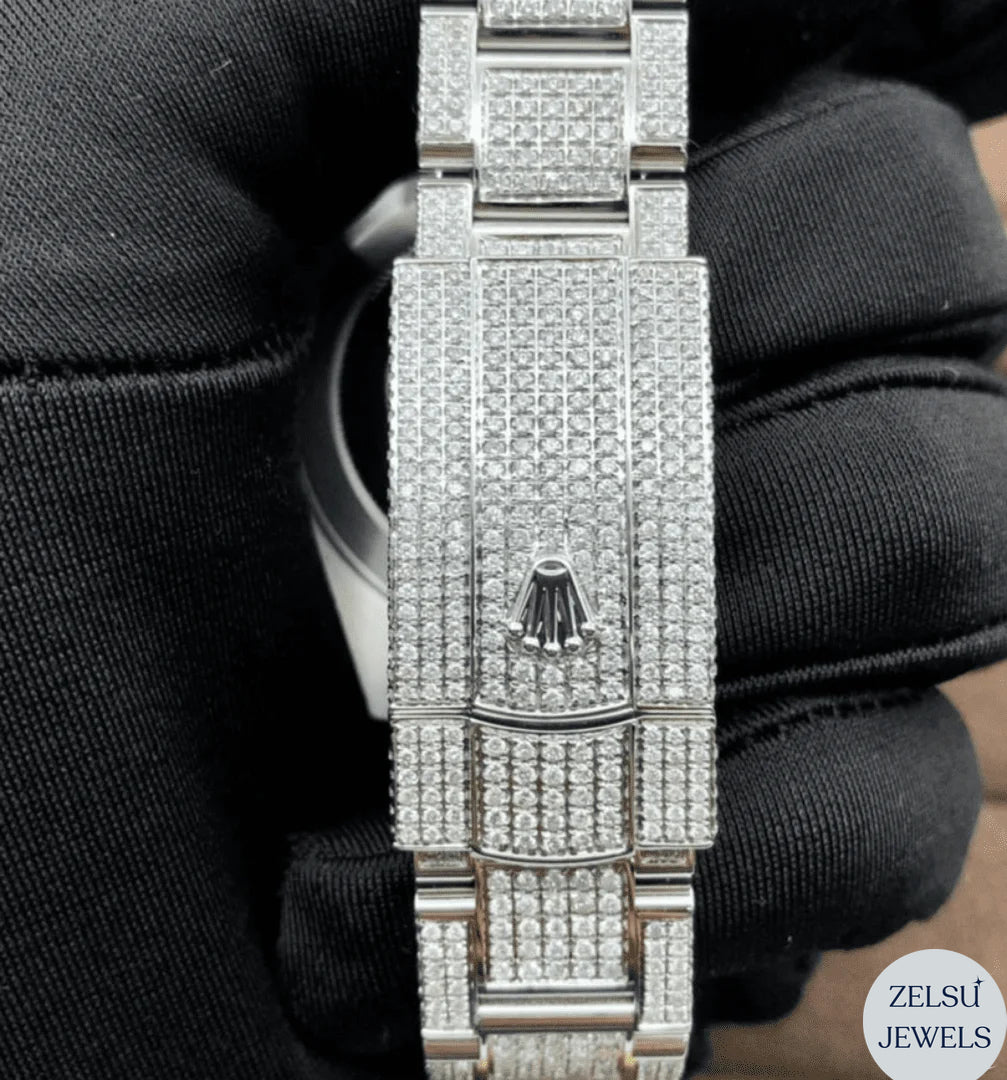 Silver moissanite watch with a dazzling rainbow dial and bezel, offering a striking and vibrant timepiece.