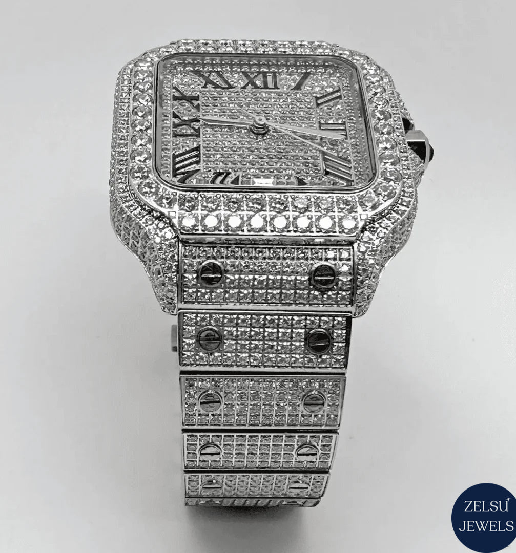 Cartier bust-down watch with a rich blue dial and sparkling diamond accents, offering both luxury and bold style.