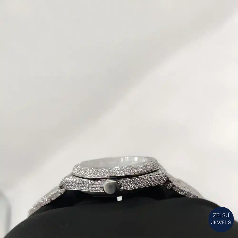 Classic silver diamond watch with diamond-encrusted bezel for a luxurious touch.