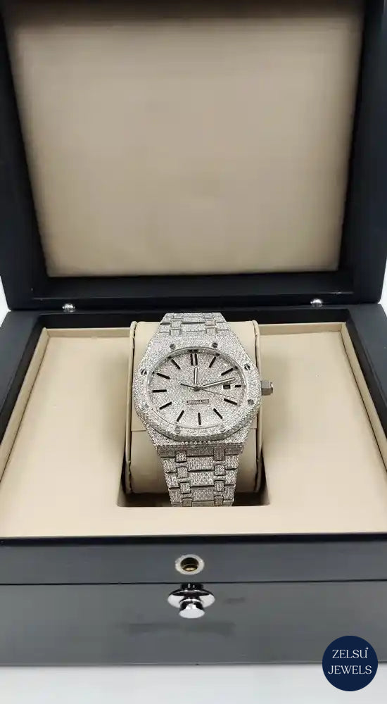 Stylish silver diamond watch with radiant diamond accents, perfect for luxury watch lovers.