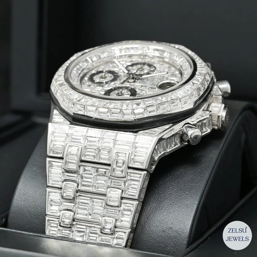 Sleek silver automatic watch with emerald diamonds for a sophisticated and modern design.