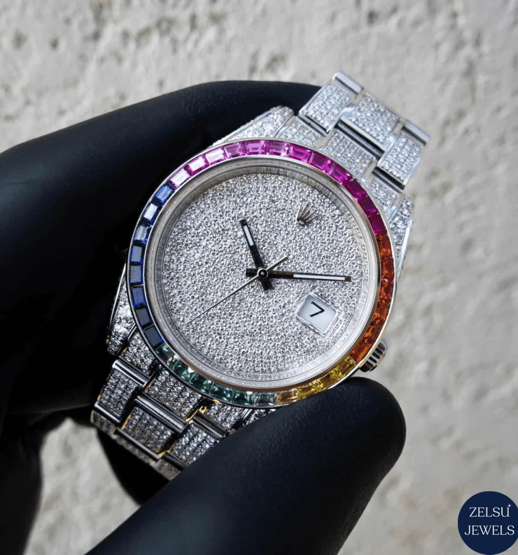 Silver diamond watch with a radiant rainbow bezel, perfect for those who appreciate both luxury and color.