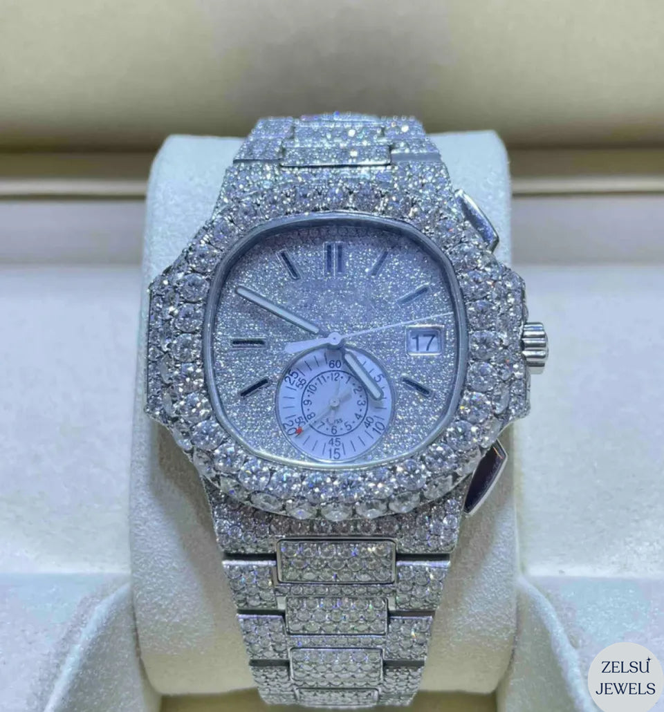 Exquisite fully diamond watch, featuring brilliant diamonds covering the entire timepiece for a luxurious design.
