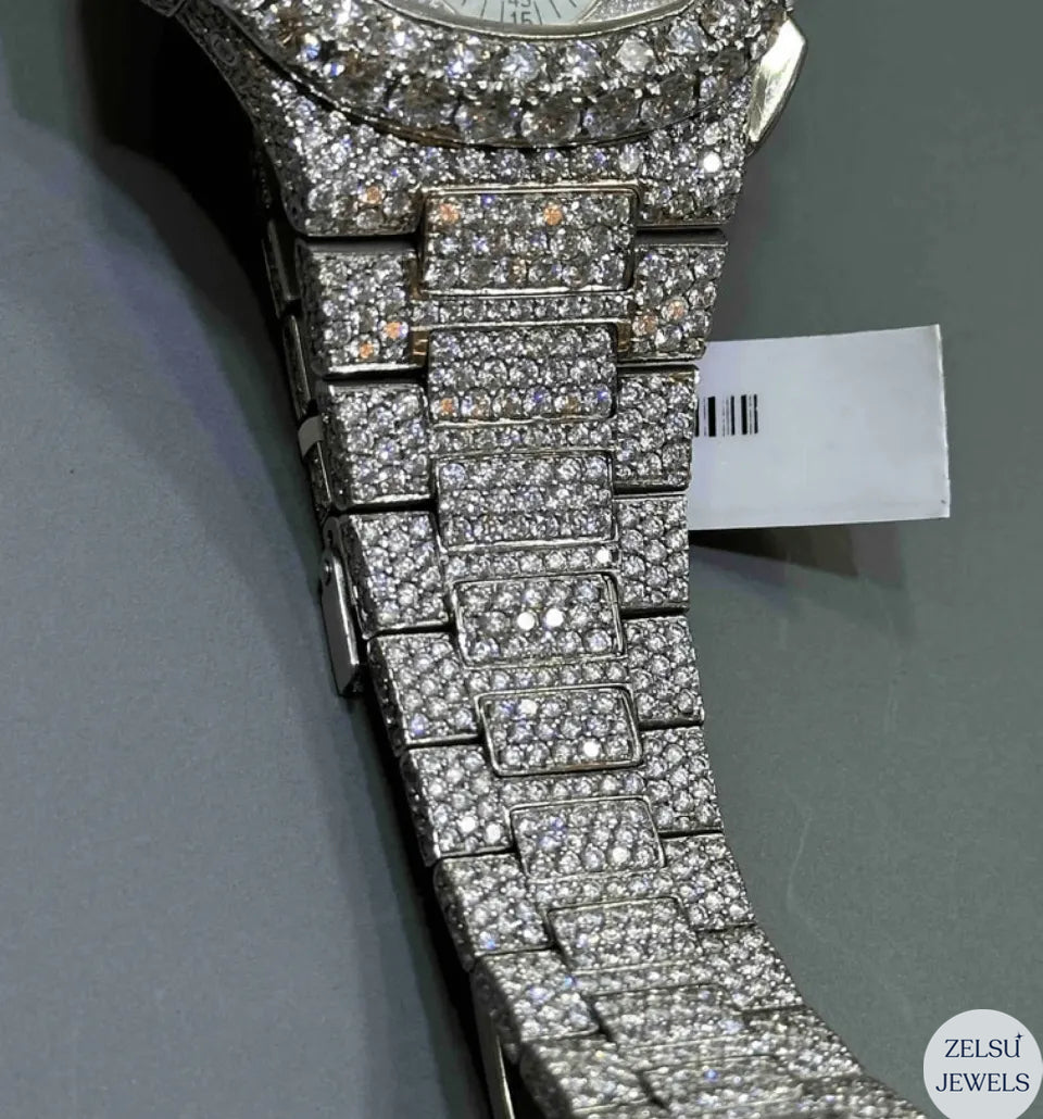 Exquisite fully diamond watch, offering unmatched luxury with every surface covered in radiant diamonds.