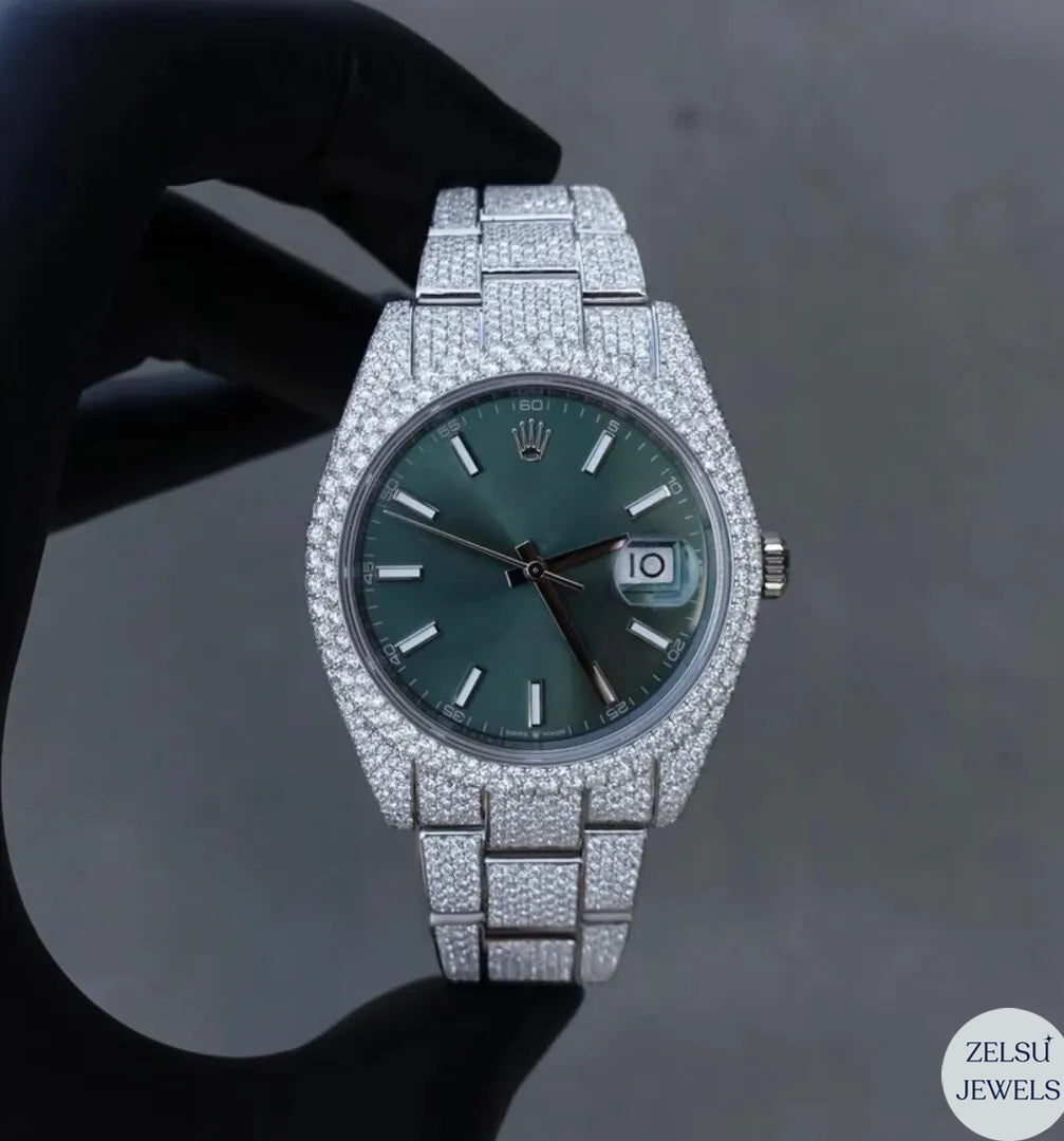Rolex-inspired silver diamond watch with a vibrant green dial and radiant diamond accents.