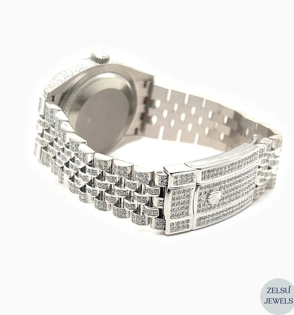 Elegant silver diamond watch with green dial and Rolex-style design for a luxury look.