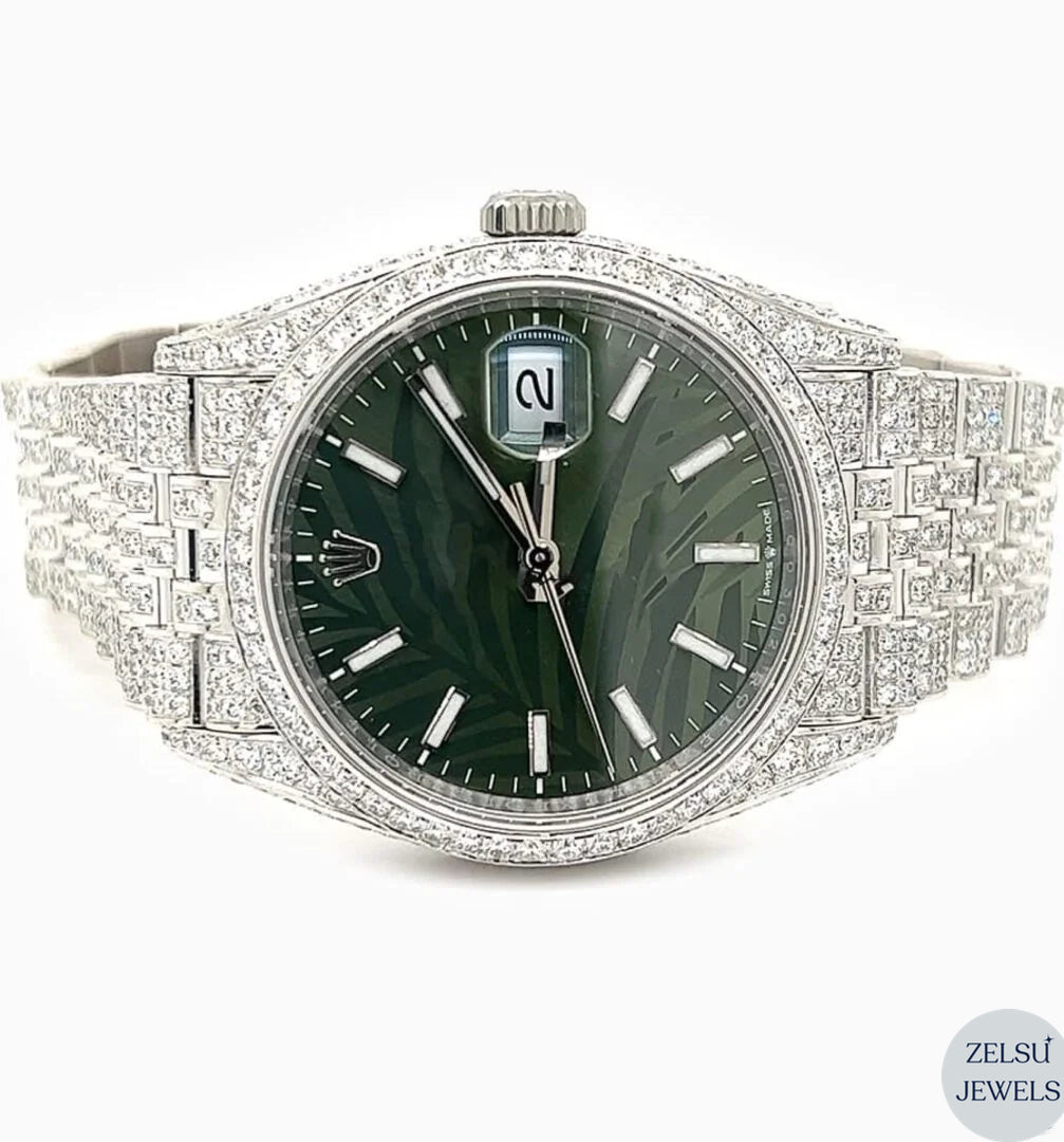 Silver diamond watch with a striking green dial, inspired by Rolex, for an elegant, bold style.