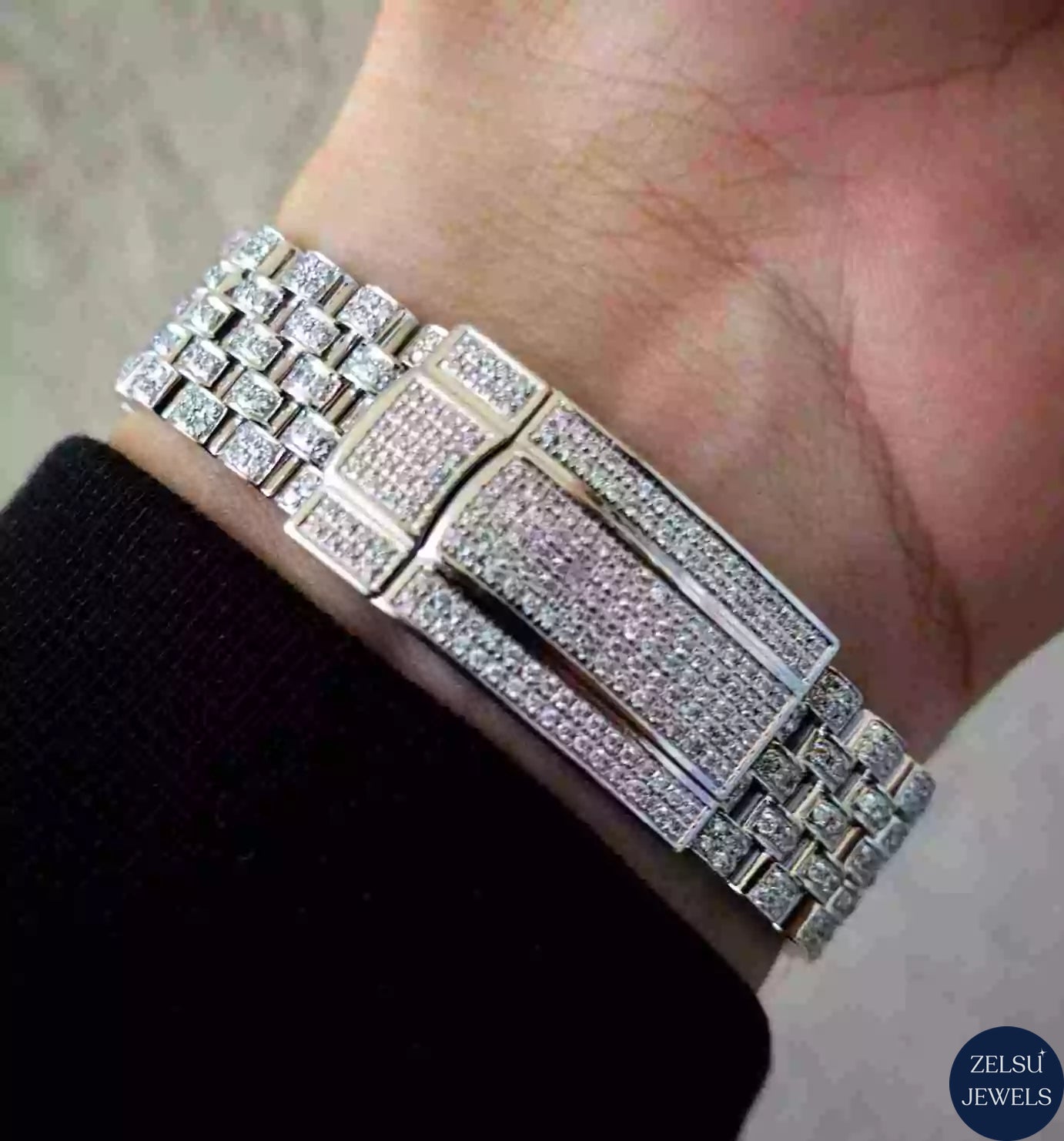 Elegant silver moissanite diamond watch featuring a rainbow bezel and flawless VVS clarity diamonds for a sophisticated look.