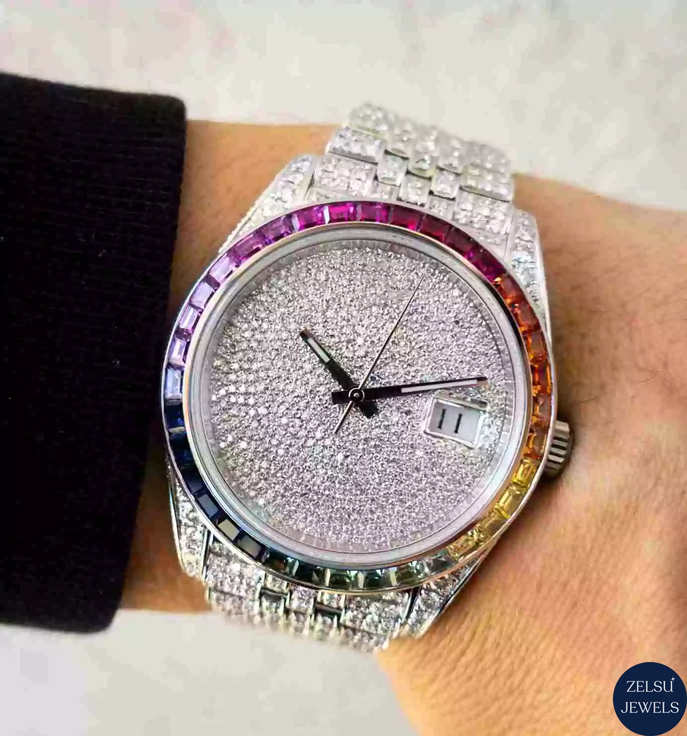 Exquisite silver moissanite diamond watch with a colorful rainbow bezel and VVS clarity diamonds, perfect for a luxury statement.