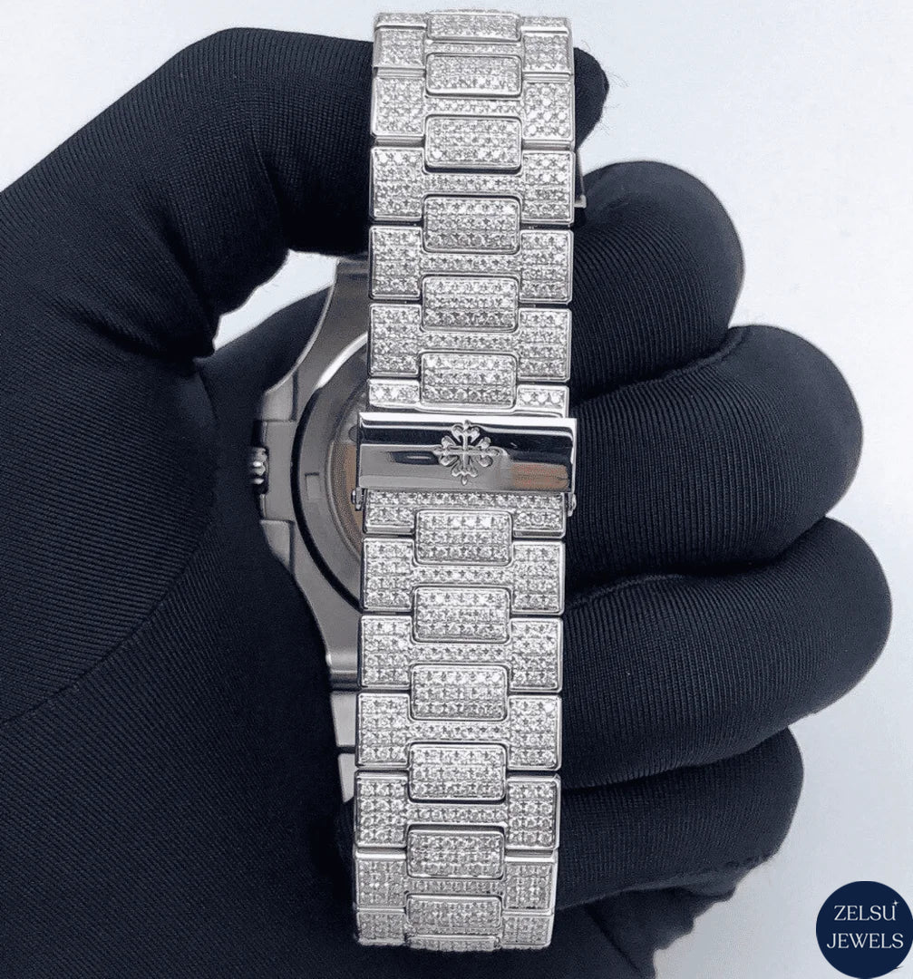 Exquisite silver moissanite watch with bust-down diamonds, offering a combination of luxury and timeless design.