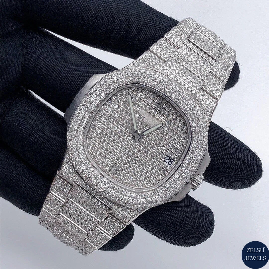 Sophisticated silver moissanite watch with bust-down diamonds, perfect for collectors who appreciate opulence and craftsmanship.