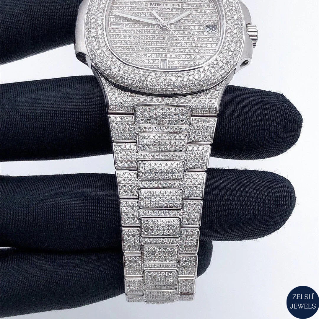 Stunning silver moissanite watch with radiant bust-down diamonds, combining bold style with classic elegance.