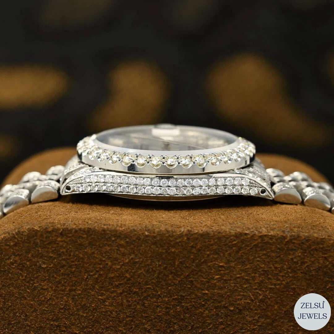 Sophisticated silver moissanite diamond watch with a vibrant red crystal dial and brilliant diamonds for a timeless, luxurious design.