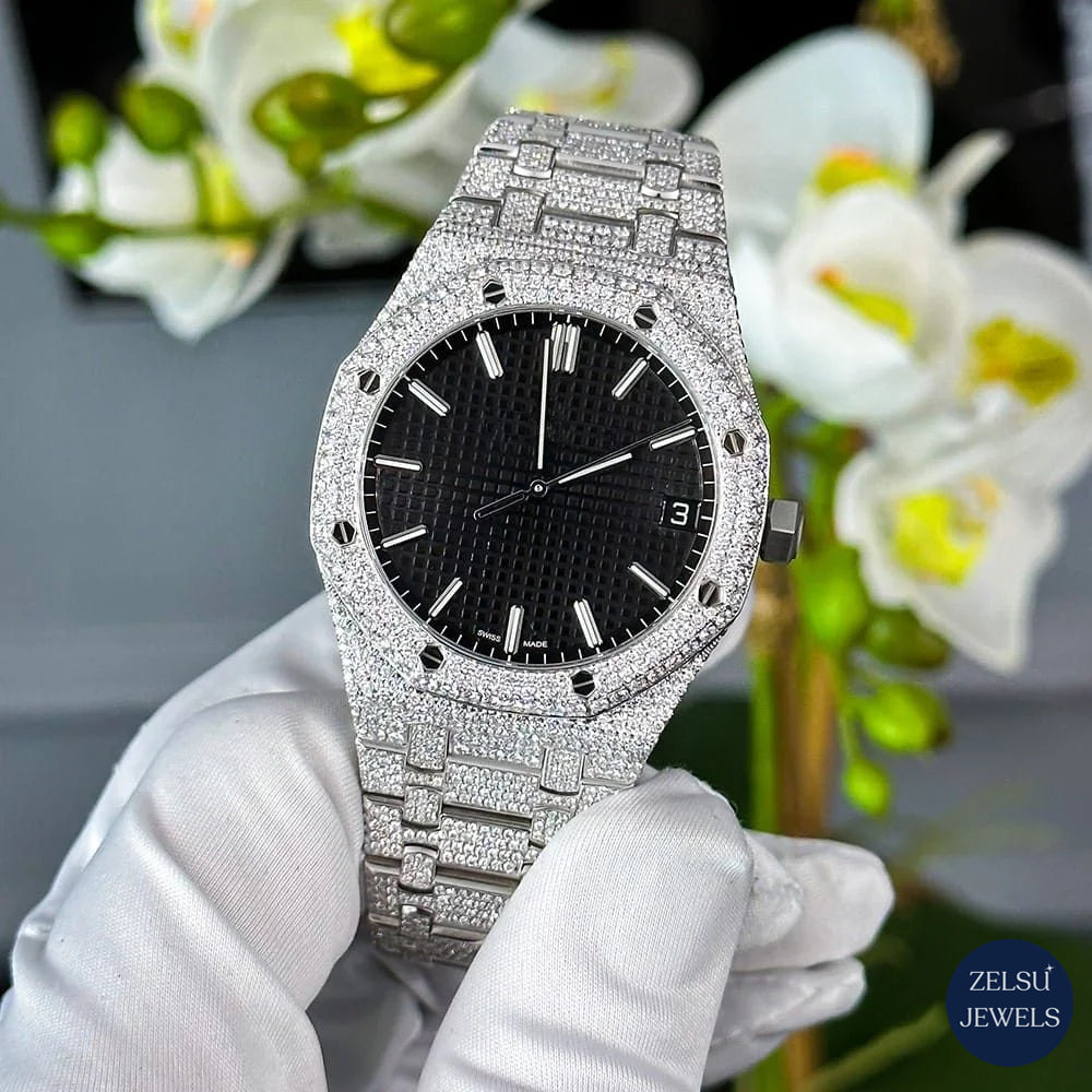 Elegant silver watch featuring a black crystal dial, offering a bold and luxurious look for a sophisticated accessory.