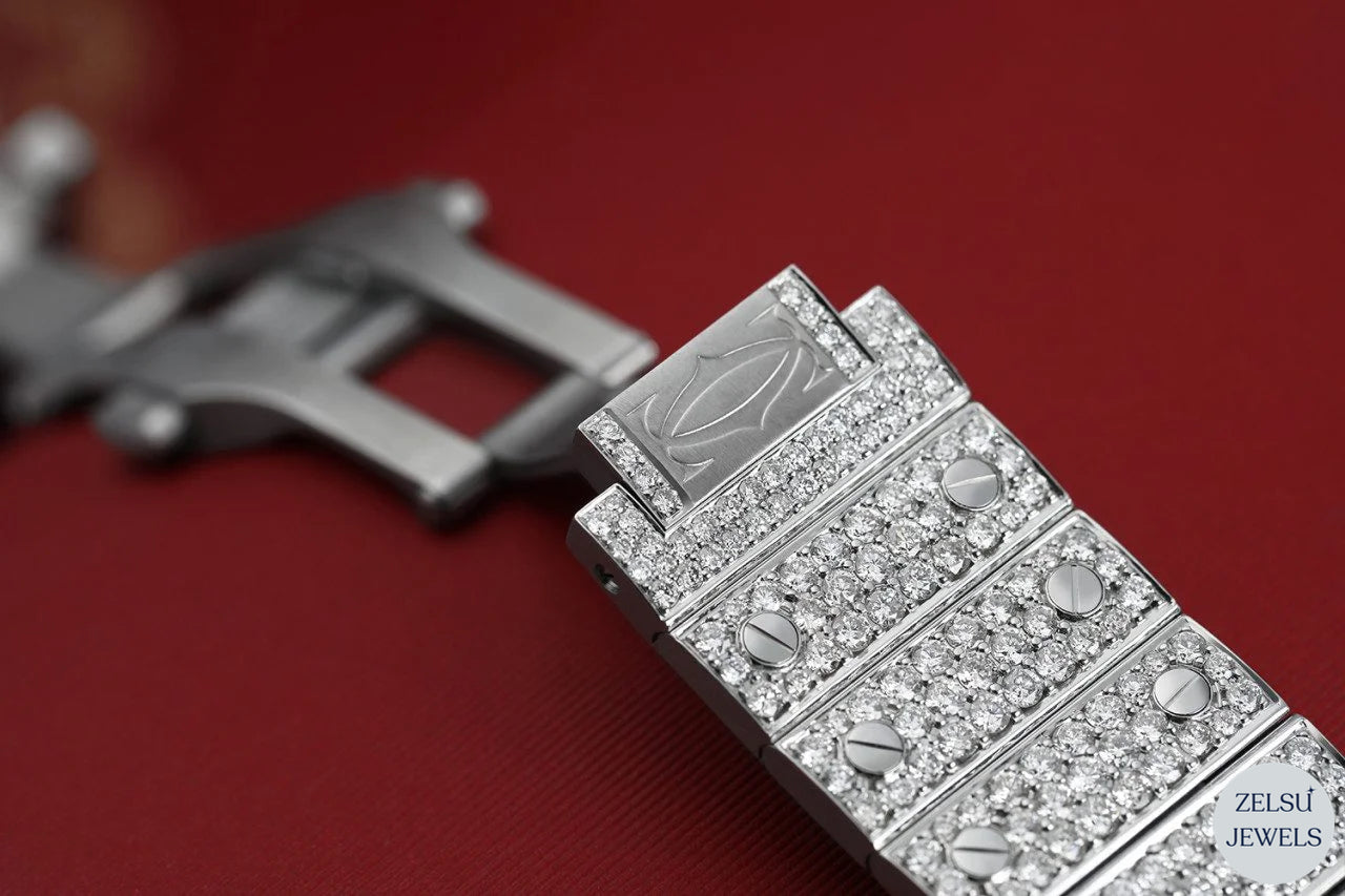 Sophisticated Cartier watch featuring a striking blue diamond crown, offering both style and elegance.