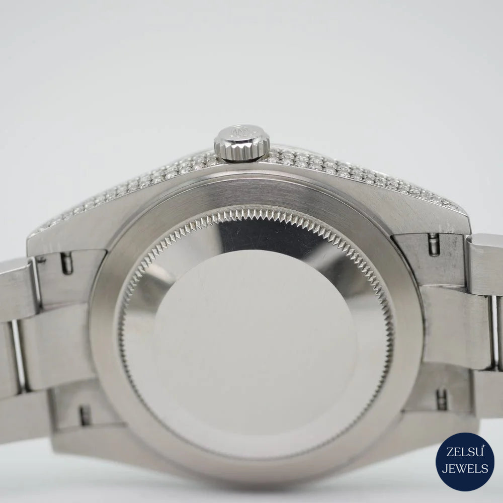 Stunning silver diamond watch with an orange crystal dial, featuring a dazzling diamond bezel for a vibrant, luxury timepiece.
