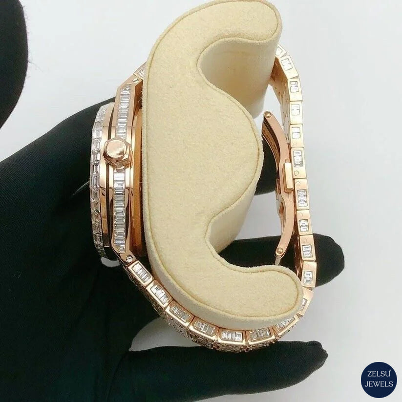 Stunning emerald diamond watch with rose gold stainless steel, offering both sophistication and style.