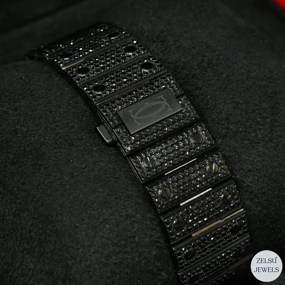 Royal-style black diamond bust-down watch, combining elegance and bold design for a luxury timepiece.