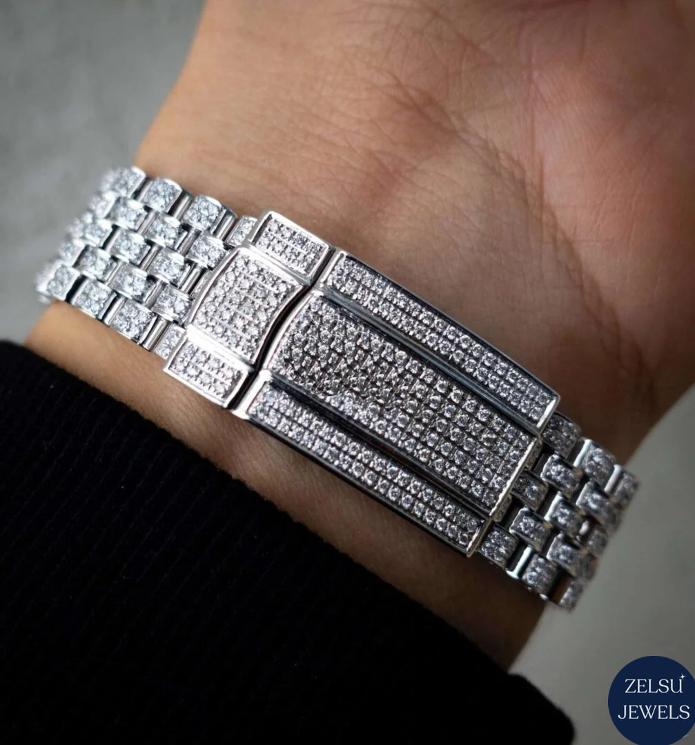 Stunning silver diamond watch with a black crystal dial, offering a sleek and sophisticated luxury timepiece.
