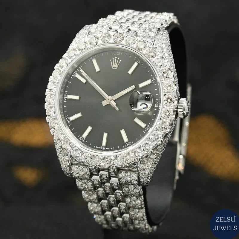 Luxury silver diamond watch with black crystal dial, offering a striking combination of elegance and modern style.