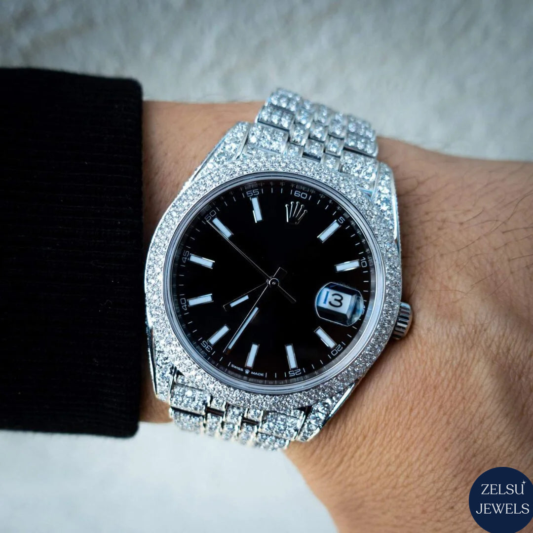 Sophisticated silver diamond watch with black crystal dial, combining sleek design with luxury and brilliance.