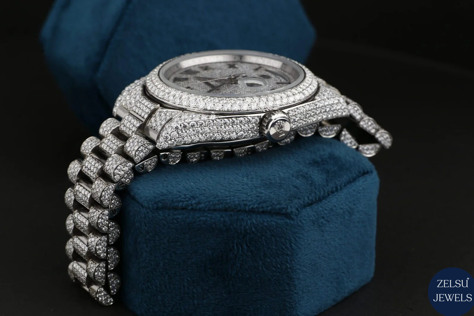 Luxury Rolex silver bust-down diamond watch with sparkling diamonds, perfect for fashion-forward individuals.
