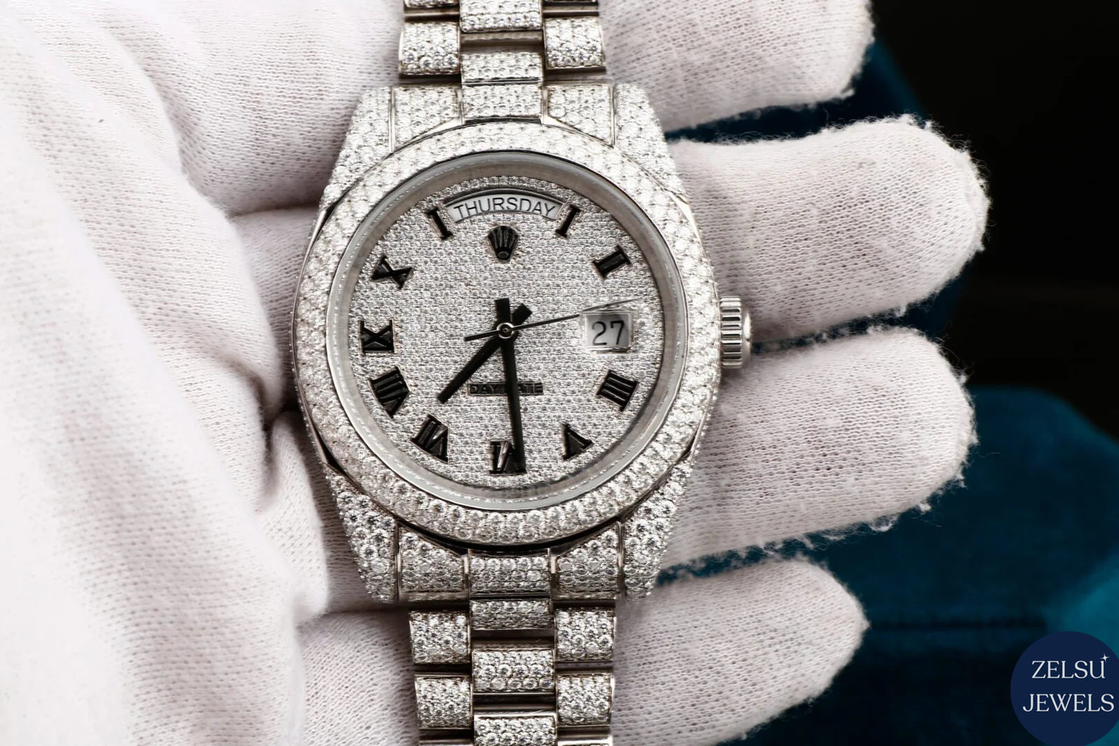 Rolex silver bust-down diamond watch, combining iconic Rolex craftsmanship with dazzling diamonds for ultimate luxury.