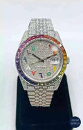 Stunning silver diamond watch with a vibrant rainbow dial and bezel, combining luxury and bold design.