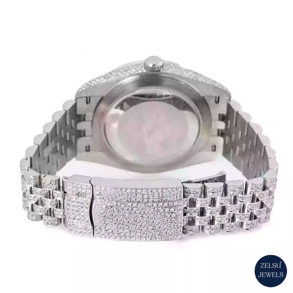 Luxury silver diamond watch with rainbow dial and bezel, offering a bold, colorful, and opulent design.