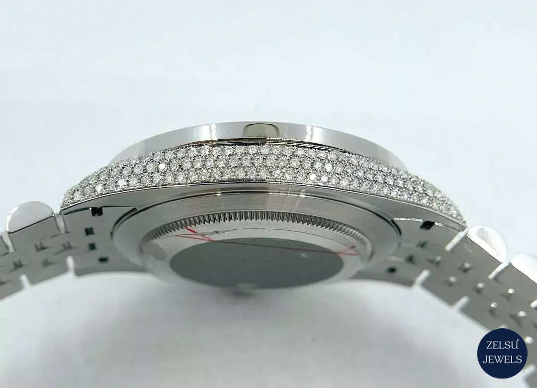 Sophisticated silver diamond watch with rainbow dial and bezel, offering both elegance and a bold pop of color.