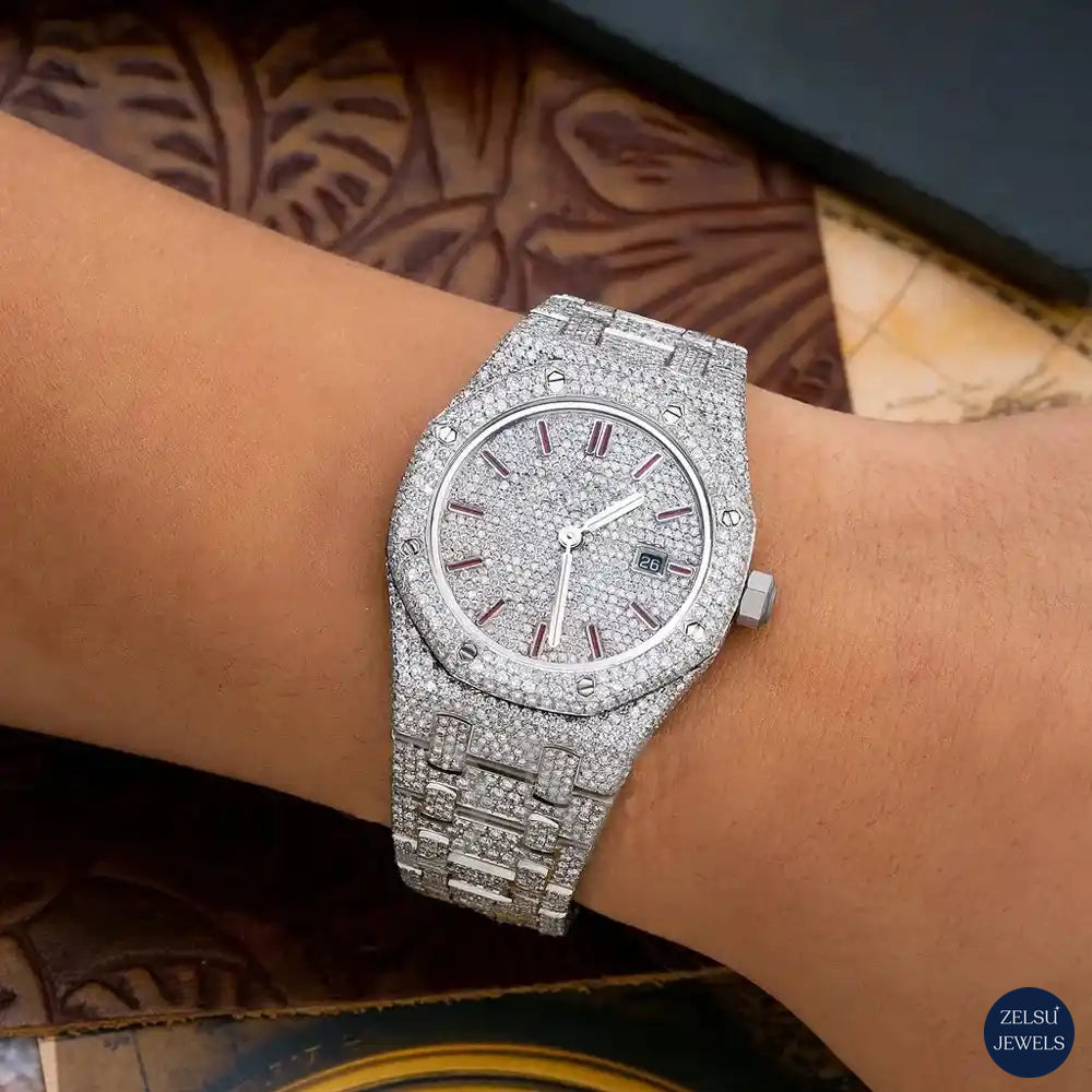 Luxury silver diamond watch with a striking red dial, perfect for a bold and stylish look.