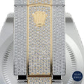 Two-tone Rolex watch with a bust-down diamond design, offering unmatched elegance and stunning shine.