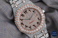 Exquisite Roman dial bust-down watch with radiant diamonds, combining classic Roman numerals with luxury diamond accents.