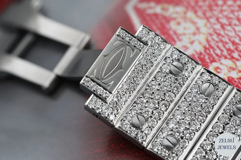 Sophisticated bust-down diamond watch with radiant blue diamonds in the crown bezel, offering a high-end appeal.