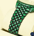Rolex green diamond wristwatch with stunning diamonds and a refined design, perfect for luxury collectors.