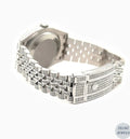 Elegant silver diamond watch with green dial and Rolex-style design for a luxury look.