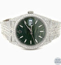 Silver diamond watch with a striking green dial, inspired by Rolex, for an elegant, bold style.