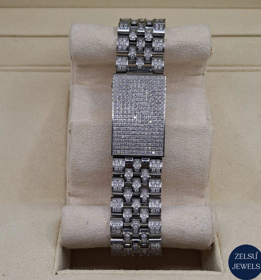 Elegant silver Rolex-style diamond watch with diamond-encrusted bezel and classic design.