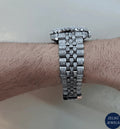 Rolex-inspired silver diamond watch with impeccable design and dazzling diamond accents.